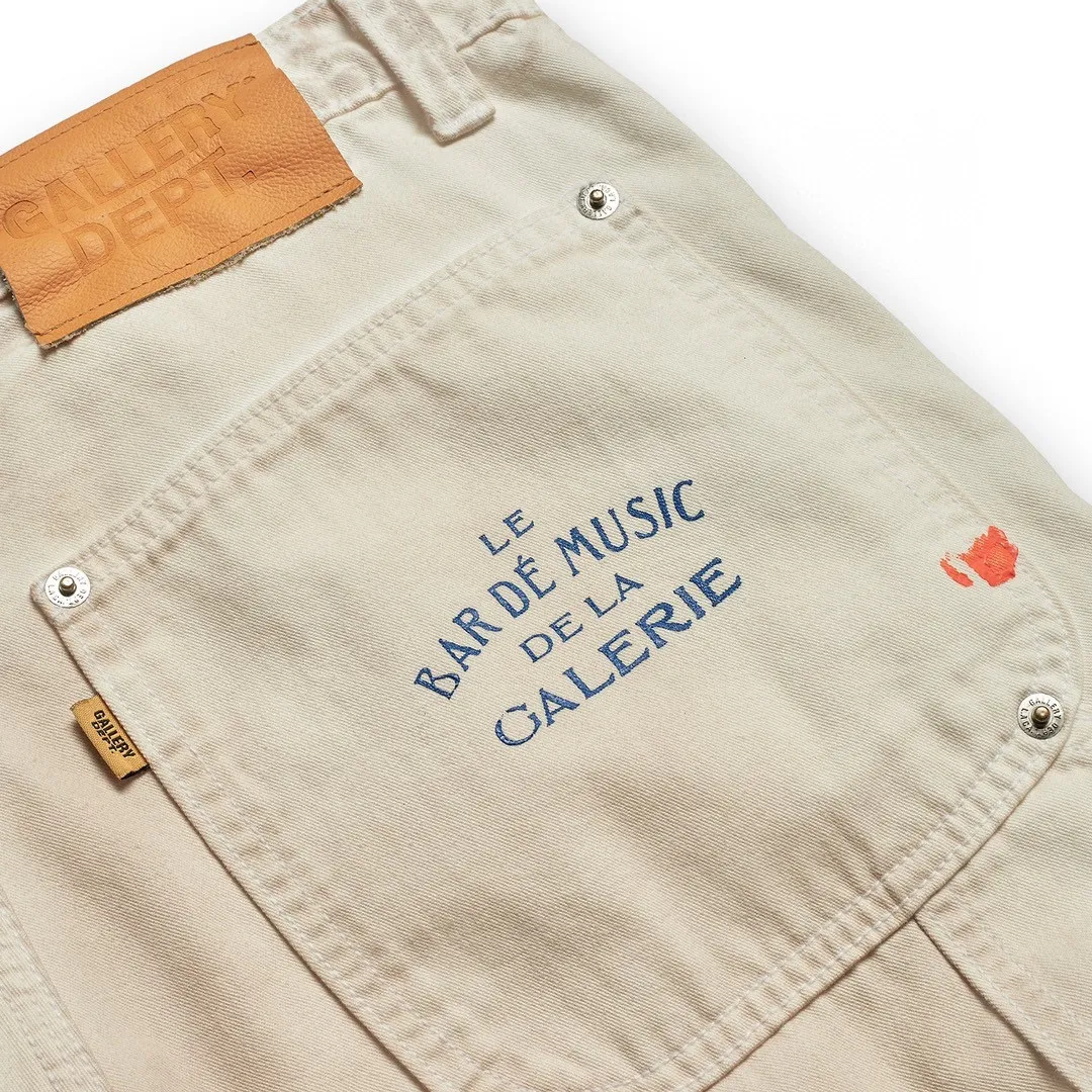 GALLERY DEPT. PAINTED CARPENTER FLARE graffiti logging pants, size 30/32/34/36, pure logging workwear style! Super heavy industry, mud dyeing and cleaning, worn out holes, all molded and customized, accessories are complete and correct! Artificial ink graffiti, tedious and heavy work